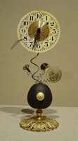 "Small Exploding Clock" - Timepieces by Roger Wood